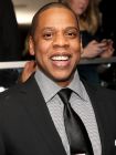 Jay Z изглежда е най-щастливият човек на замята, след като е сниман за първи път след раждането на дъшеря му