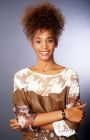 Една от първите промоционални снимки на Whitney Houston от 1985